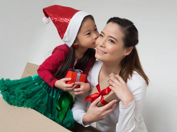 Happy Asian family, Mother giving gift box to Daughter.happy family christmas concept