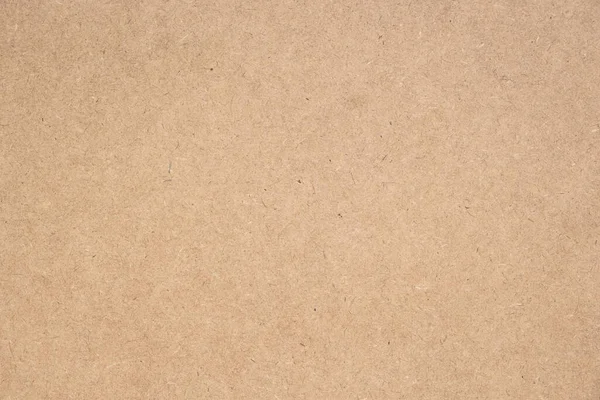 Kahverengi el sanatları veya kraft kağıt arkaplan, mukavva sayfa, geri dönüşüm kağıdı, metin için kopyalama alanı.