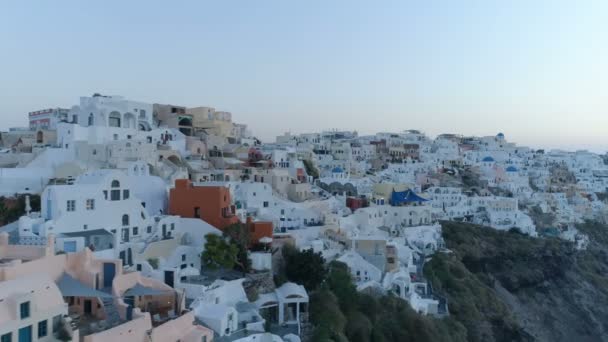 Aerial view flying over city of Oia on Santorini Greece — Stock Video