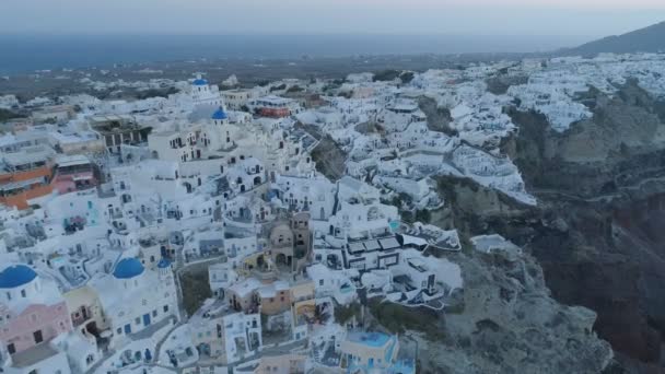 Aerial view flying over city of Oia on Santorini Greece — Stock Video