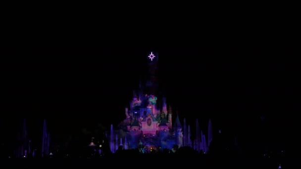 Paris, France - April 2, 2019: people at evening show Disneyland Illuminations — Stock Video