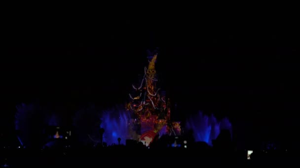 Paris, France - April 2, 2019: people at evening show Disneyland Illuminations — Stock Video