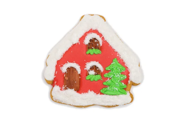 Peperkoek cookie besneeuwde huis met kerstboom — Stockfoto