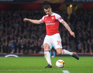 LONDON, ENGLAND - 2 Mayıs 2019: Arsenal 'den Granit Xhaka, Avrupa Ligi' nin 2018 / 19 Avrupa Ligi yarı final karşılaşmasında Emirates Stadyumu 'nda Arsenal FC (İngiltere) ile Valencia CF (İspanya) arasında resmedildi..