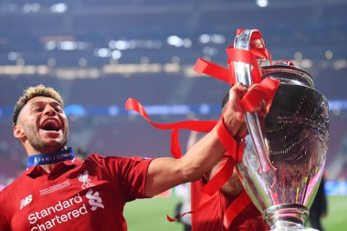 MADRID, SPAIN - JUNE 1, 2019: Alex Oxlade-Chamberlain of Liverpool pictured after the award ceremony held at the end of the 2018/19 UEFA Champions League Final between Tottenham Hotspur (England) and Liverpool FC (England) at Wanda Metropolitano. clipart