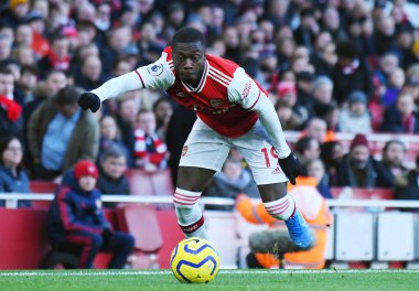 LONDON, ENGLAND - 18 Ocak 2020: Nicolas Pepe of Arsenal, Arsenal FC ile Sheffield United FC arasında oynanan 2019 / 20 Premier Lig maçı sırasında Emirates Stadyumu 'nda çekilmiştir..