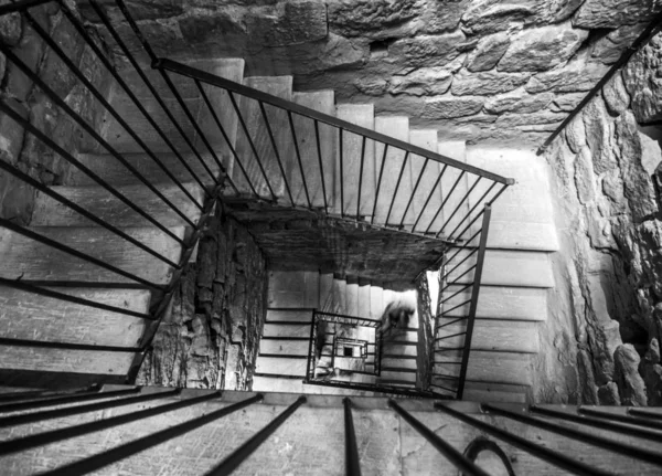 ghosts climb the internal staircase of the historic stone tower