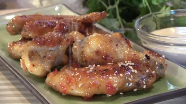 Asian Teriyaki Chicken Wings Sesame Seed Garnish — Stock Video