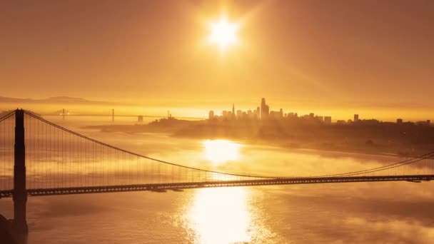 Warm Sunlight Golden Gate Bridge Low Rolling Fog — Stock Video