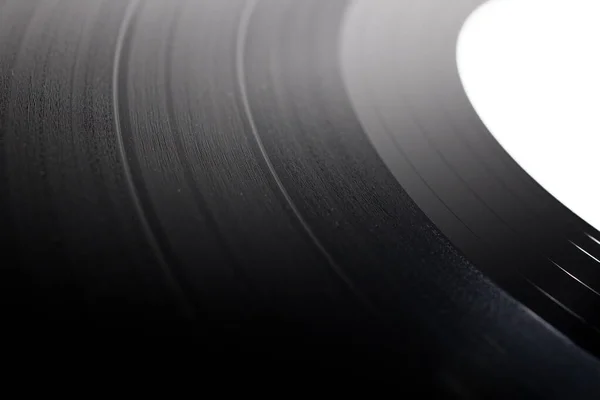 12 inçlik vinil plağın soyut yakın çekimi. Geçmişten klasik analog müzik. Ses kanalları.