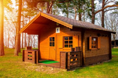 Traditional wooden camping cottage. clipart