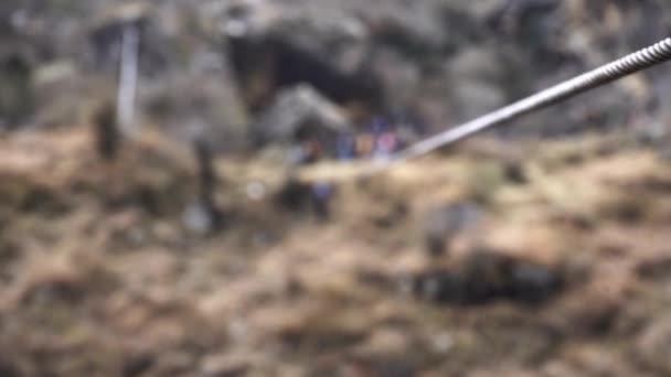 A tourist girl doing rope rappelling in — Stock Video