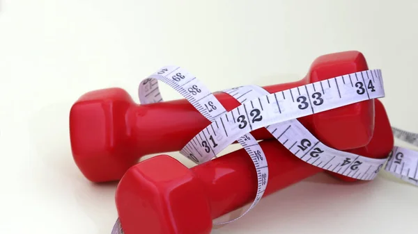 Two Red Dumbbell Tape Measure — Stock Photo, Image