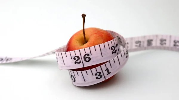 White Tape Measure Wrapped Red Apple — Stock Photo, Image