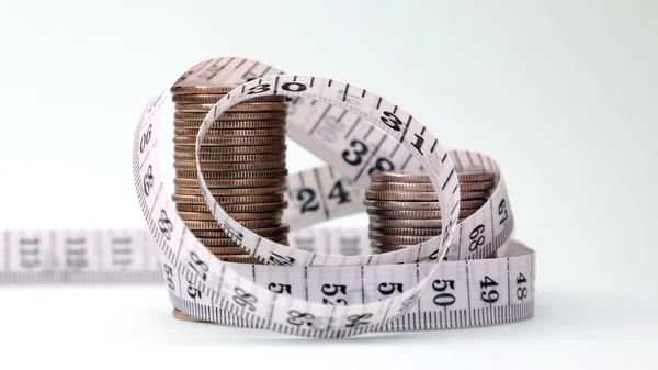 Two Pile Coins Tape Measure Budget Reduction Concept — Stock Photo, Image