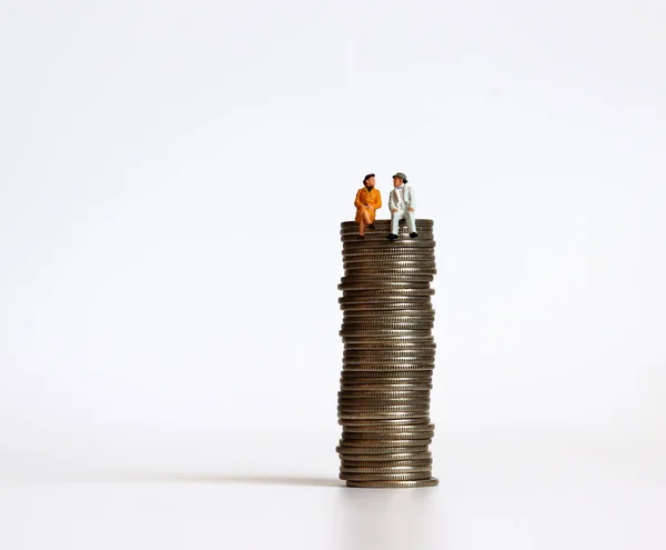 Miniature People Pile Coins Concept Economic Problems Aging Society — Stock Photo, Image