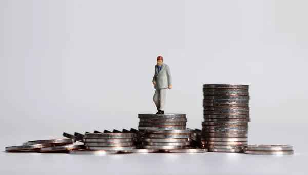 Miniature Old Age Man Walking Pile Coins — Stock Photo, Image