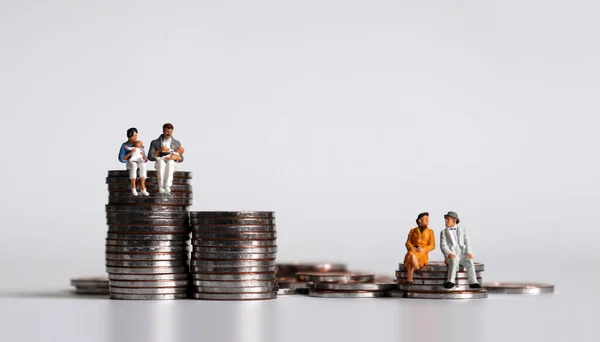 Coins Miniature People Concept Generational Economic Gap — Stock Photo, Image