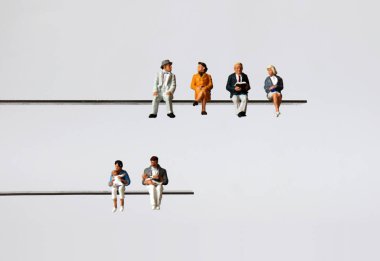 The concept of an aging society and low birthrate. Miniature people. clipart