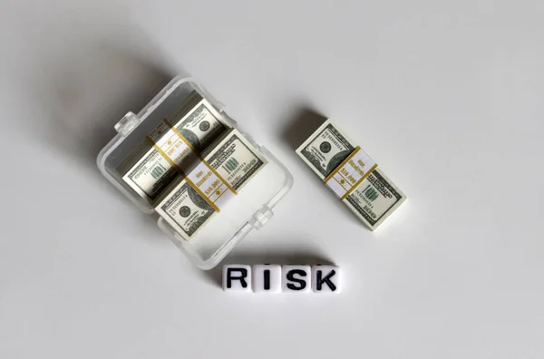 White Cube Risk Text Case Containing Hundred Dollar Bills — Stock Photo, Image