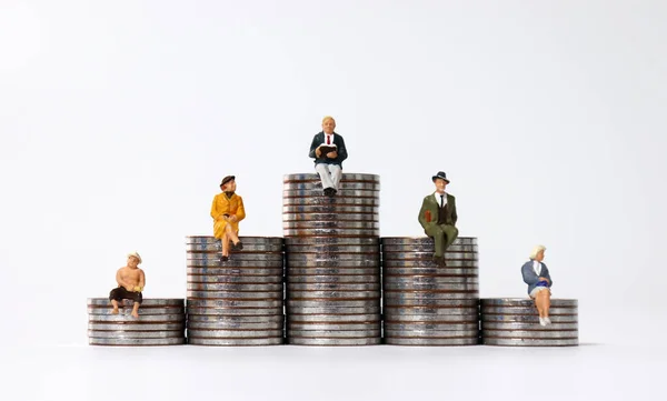 Miniature People Sitting Piles Coins — Stock Photo, Image