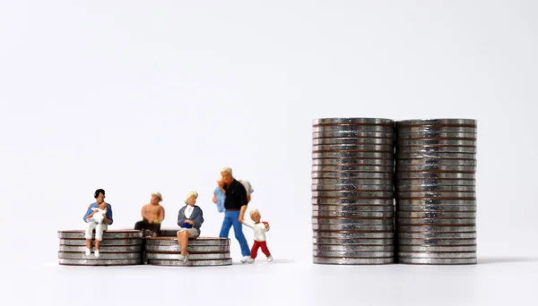 Divided Coin Piles Miniature People — Stock Photo, Image