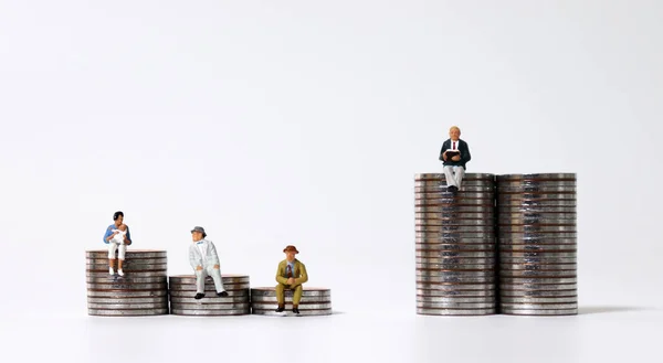 Miniature People Sitting Piles Coins — Stock Photo, Image