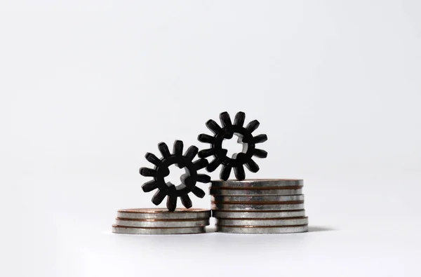 Two Cogwheels Two Pile Coins — Stock Photo, Image
