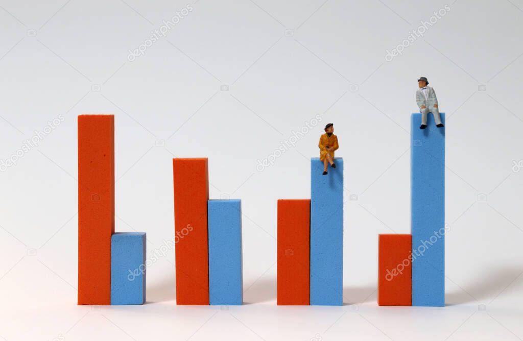 Miniature people sitting on a bar graph. The concept of an aging society.