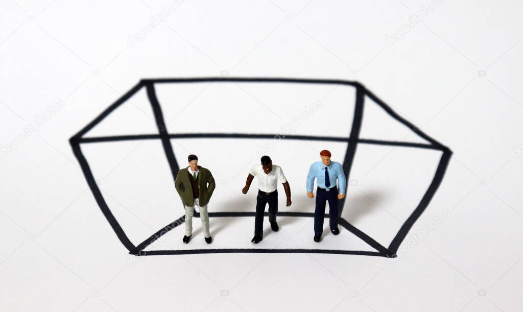 Miniature people and a rectangle of black solid lines. The concept of racial discrimination in work.