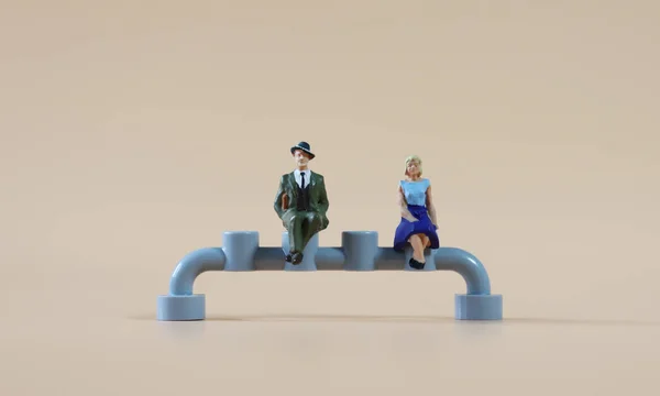 Miniature People Sitting Distance — Stock Photo, Image