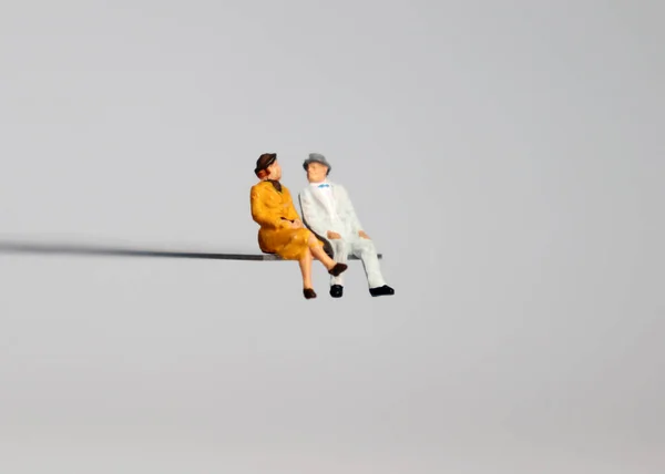 Miniature Old Age Couple Sitting Edge Precipice — Stock Photo, Image