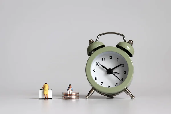 Alarm Clock Miniature Women Concept Women Time Economic Poverty — Stock Photo, Image