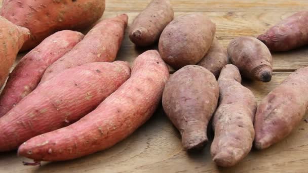 Closeup Sweet Potatoes Wood Background — Stock Video