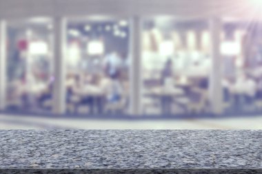 Lokanta arka planı bulanık mermer masa