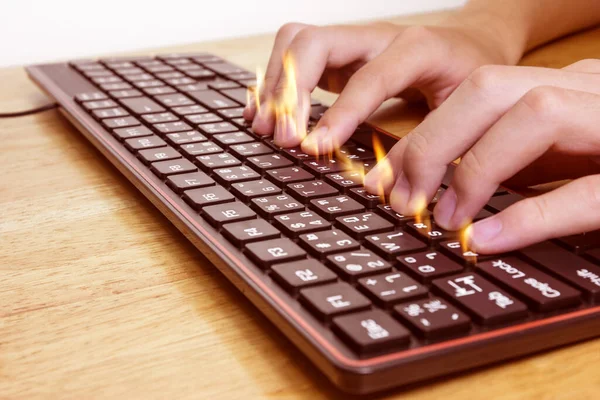 Close up of typing male hands on black keyboard,Businessman working concept