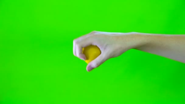 Mão Segurando Uma Bola Estresse Com Tela Verde — Vídeo de Stock