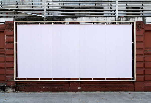 white billboards hanging on wall 
