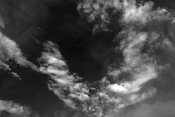 sky with black and white cloud textured backgroun