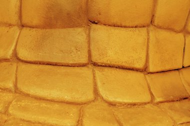 Altın taş duvar inşaatı arka planı