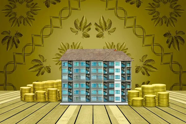 Start creating family with top table condominium and coin on golden leaves pattern background,Dream family concepts