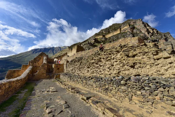 Ollantaytambo Ruins - the hill of the Temple, constructions made of field stone, coarsely cut, the Middle and Funerary Sectors have several rectangular funerary buildings, some of them with two floors