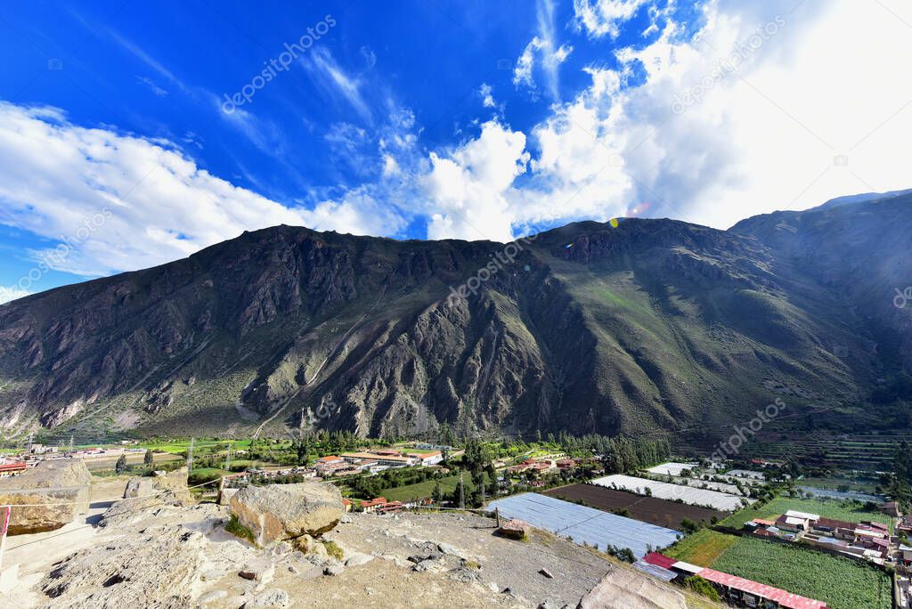 Ollantaytambo is a town and an Inca archaeological site in southern Peru some 72 km  by road northwest of the city of Cusco. It is located at an altitude of 2,792 m  above sea level in the district of Ollantaytambo, province of Urubamba, Cusco region