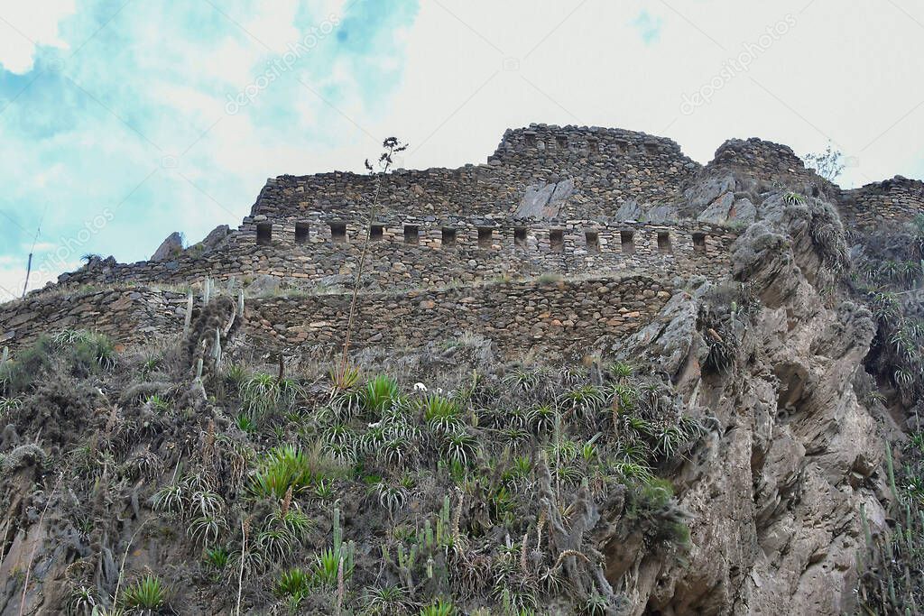 Ollantaytambo Ruins - the hill of the Temple, constructions made of field stone, coarsely cut, the Middle and Funerary Sectors have several rectangular funerary buildings, some of them with two floors