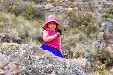 Taquile, Titicaca Gölü 'nün Peru tarafında, Puno şehrinden 45 km açıkta bulunan bir adadır. 5,5 'e 1,6 kilometre büyüklüğündeki ve 5,72 km2' lik bir alanı bulunan adada yaklaşık 2 bin 200 kişi yaşamaktadır. Adanın en yüksek noktası 4050 metredir.