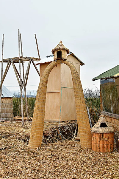 Uros floating islands- View of Lake Titicaca Urosul uses reeds, which are abundant along the shores of the lake, to make their homes, furniture, boats and islands on which they live. Their canoe-shaped boats, with animal heads at the bow, are used