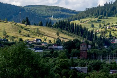 view of the village from the mountain top. the village of the carpathians in the mountains