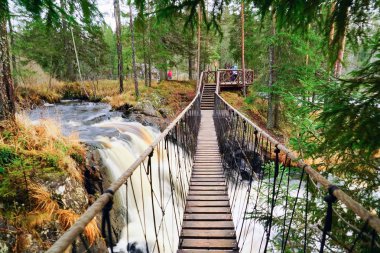 Sleeves waterfall Ahvenkoski Ruskeala waterfall . Karelia.Russia clipart
