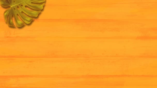 Animace pomerančů, banánů, tropických palmových listů na oranžovém pozadí.
