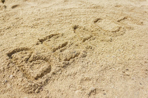 Parola Sulla Spiaggia Scritta Sulla Sabbia Spiaggia Sfondo Naturale — Foto Stock